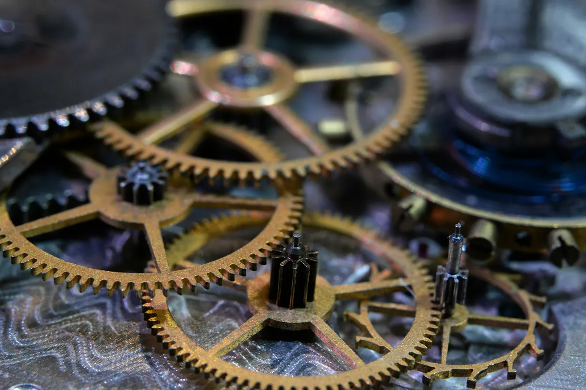 Interlocking gears representing systems